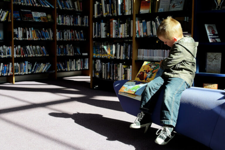 Toddler in a library